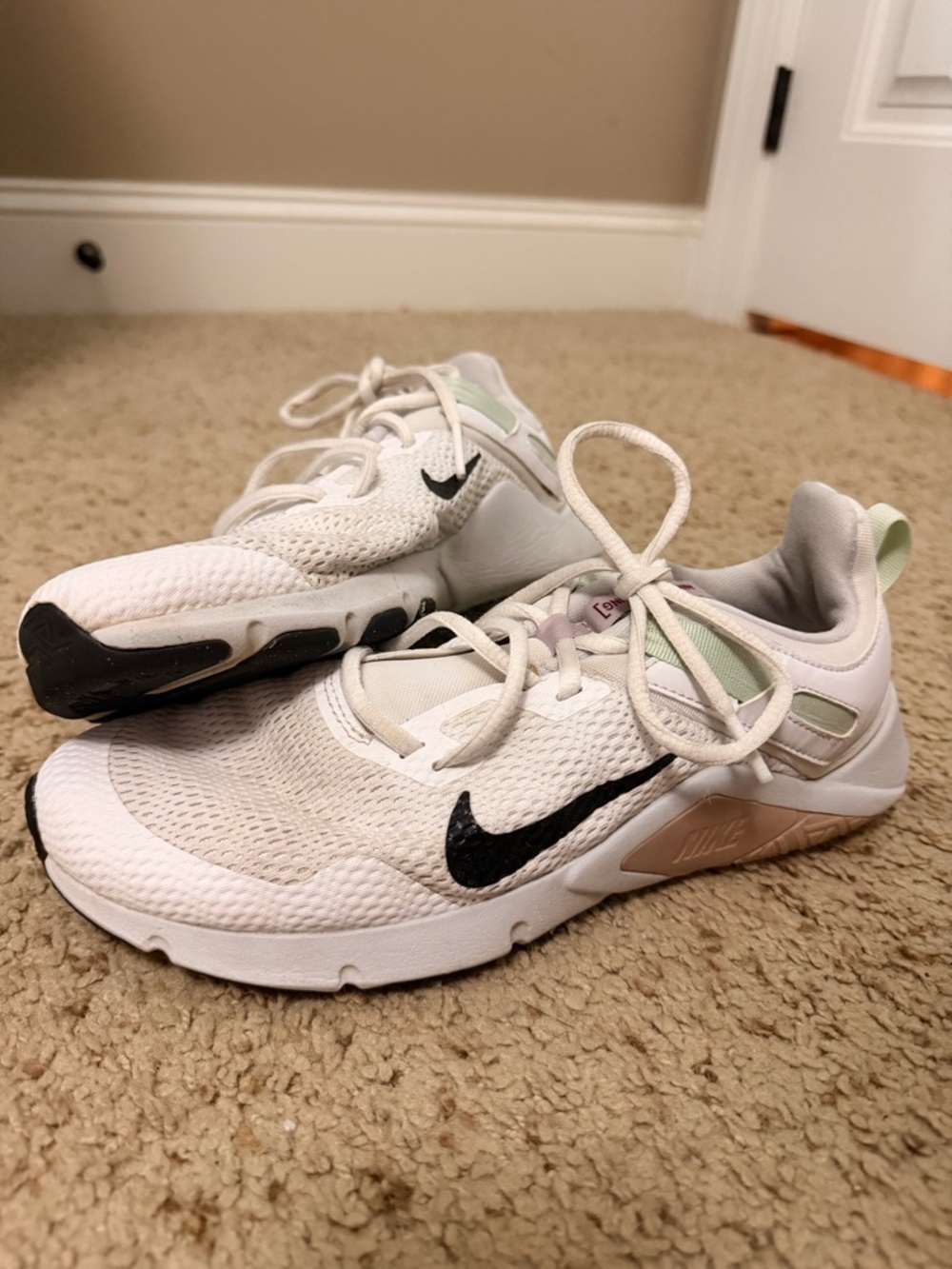 Nike White Mesh Sneakers with Black Swoosh and Pale Green Heel Tab